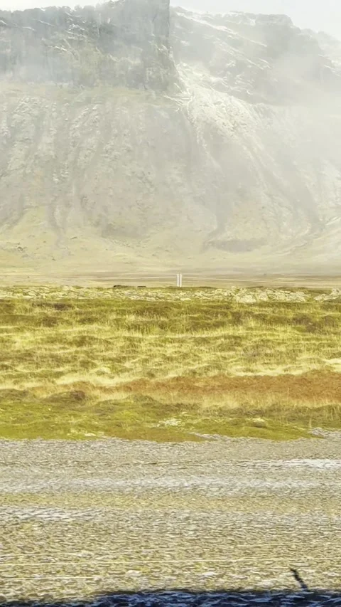 Scenic volcanic landscape with lava fields, green grasslands  in West and North 動画素材 320279550