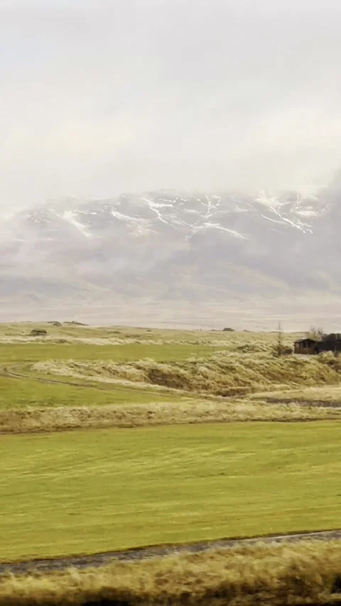 Scenic volcanic landscape with lava fields, green grasslands  in West and North 動画素材 320509912