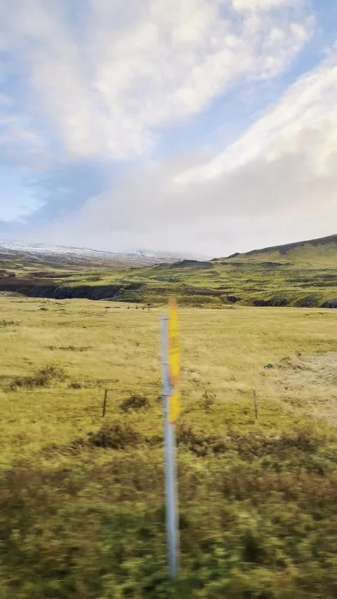 Scenic volcanic landscape with lava fields, green grasslands  in West and North 動画素材 320510641