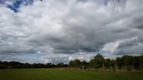 Scenic white clouds on blue sky at River Thames near Windsor. -  4k footage Stock Footage 139932899