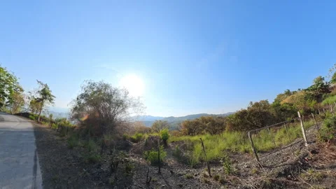 Scenic winding highway with mountain view on the right side with sound Stock Footage 332958361