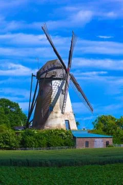 Scenic windmill with fields Stock Photos