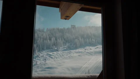 Scenic winter view from a cabin window overlooking Zillertal ski slopes Stock Footage 332985870