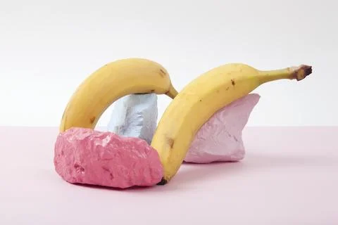A scenographic composition of a still life composed of ripe bananas and bri.. Stock Photos