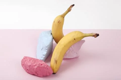A scenographic composition of a still life composed of ripe bananas and bri.. Stock Photos