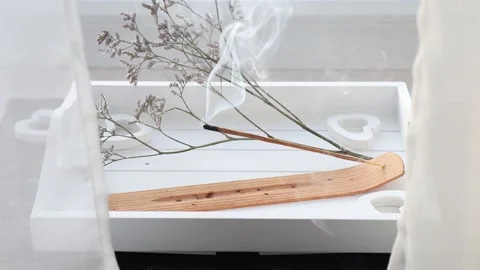 Scent Styling concept. Home window sill with incense candle burning. Video stock 221908328