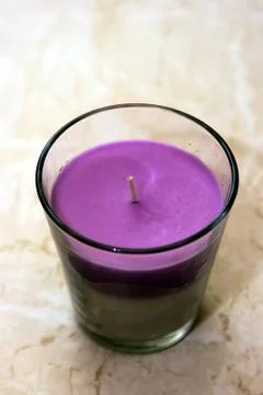 Scented candle on the table Stock Photos