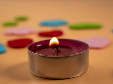Scented candles for relaxing on a beige background. Stock Photos