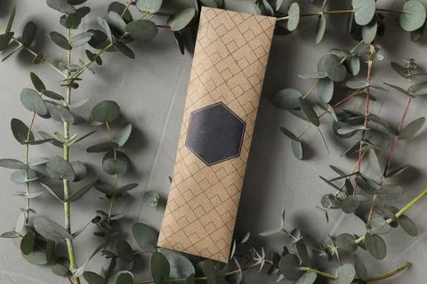 Scented sachet and eucalyptus branches on grey table, flat lay Stock Photos