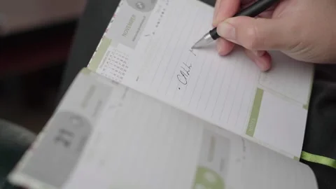 Scheduling Phone Call with Mom in November Journal Stock Footage 343974686