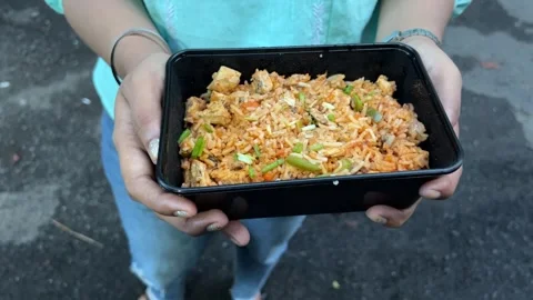 Schezwan chicken fried rice prepared in Indian style Stock Footage 310345972