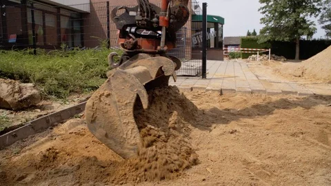 Schimmert, The Netherlands - August 3, 2017 - Close-up Shot Of Excavator Stock Footage 129398796