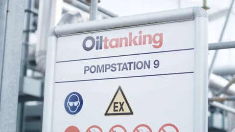 Schiphol, The Netherlands - August 29, 2017 - Tilt Shot Of A Oiltanking Pum Stock Footage 129398659