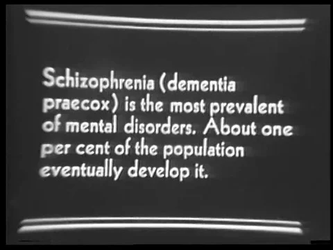 Schizophrenic patients sit and wander in the yard and hallway of a mental Stock-Footage 74875873