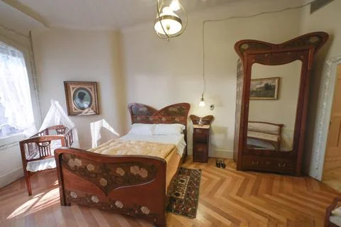  Schlafzimmer, bürgerliche Wohnung, La Pedrera, Casa Mila von Antoni Gaudi.. Stock Photos