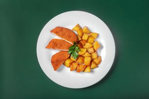 Schnitzel with potatoes for the menu Stock Photos