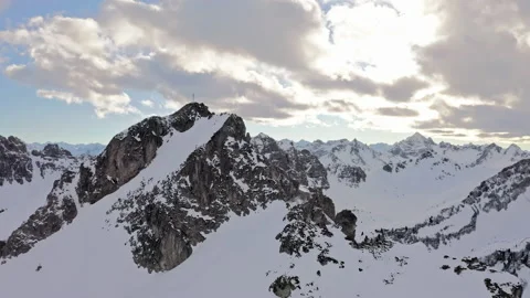 Schochenspitze Austria Tyrol Alps Snow and dramatic clouds, high mountains, Stock Footage 168718419
