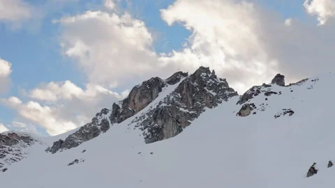 Schochenspitze Austria Tyrol Alps Snow and dramatic clouds, high mountains, Stock Footage 168758307