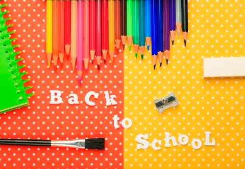 Scholar material to back to school in colored background Stock Photos