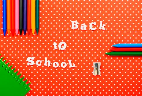 Scholar material to back to school in colored background Stock Photos