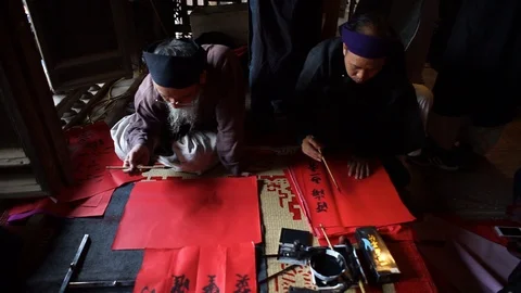 Scholar writes Chinese calligraphy characters Stock Footage 87488799