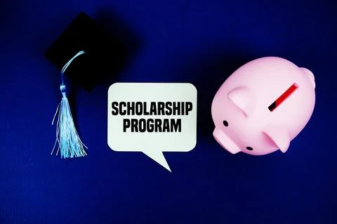 Scholarship Program text on speech bubble with piggy bank and graduation ca.. Stock Photos