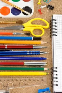 School accessories and checked notebook Stock Photos