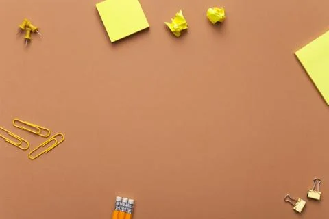 School Accessories on Brown Background Stock Photos