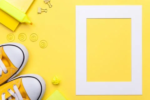School Accessories with White Frame on Yellow Background Stock Photos