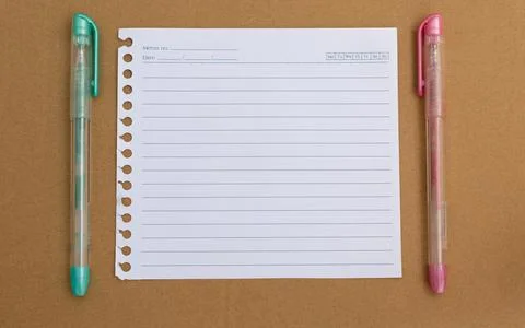 School accessories on a White table, sheet of paper and pencils Stock Photos