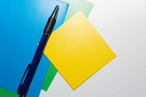 School accessories on a White table, sheet of paper and pencils Stock Photos