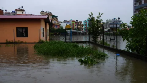 School area flooded with heavy rainfall water on the monsoon of 2024 Stock Footage 286299009