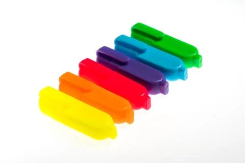 School background with several colored pens Stock Photos