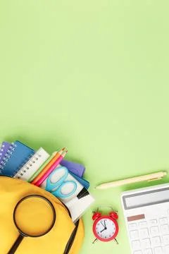 School backpack with educational supplies. Stock-Fotos