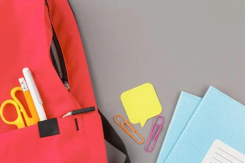 School backpack with educational supplies. Stock-Fotos