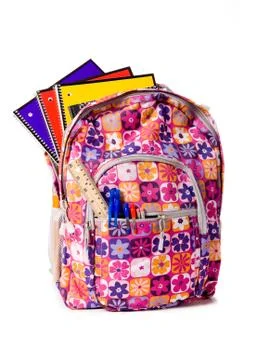 School backpack overflowing with supplies Stock Photos