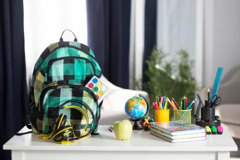The school backpack is on the table. School supplies 写真素材
