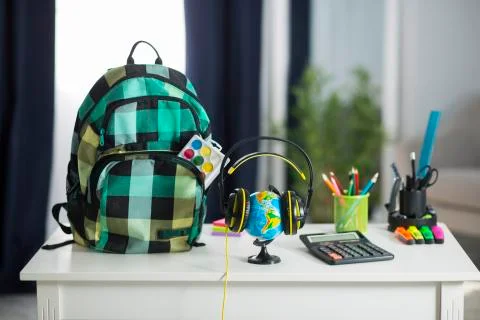 The school backpack is on the table. School supplies 写真素材