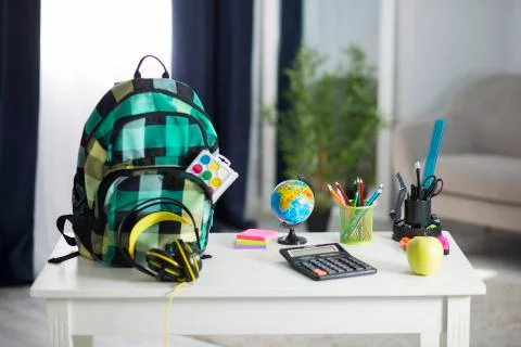 The school backpack is on the table. School supplies 写真素材