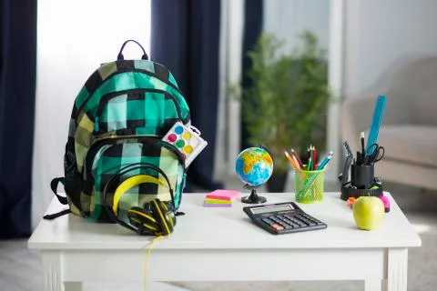 The school backpack is on the table. School supplies 写真素材