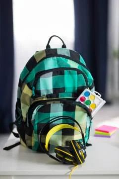 The school backpack is on the table. School supplies 写真素材