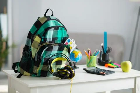 The school backpack is on the table. School supplies 写真素材