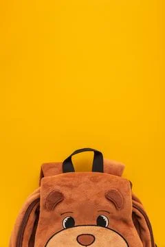 School Bear Face Plush Backpack on Yellow Background Stock Photos