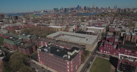 School blocks, a running track and a red brick loft building Vídeo Stock 62442327