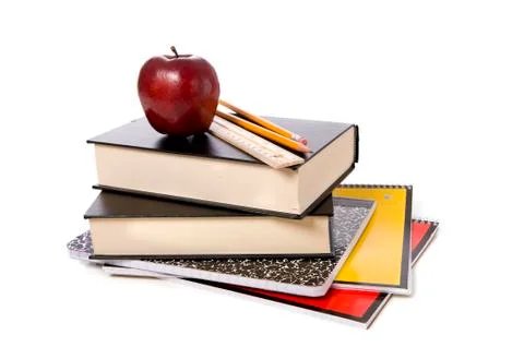School books with apple Stock Photos