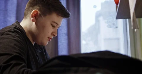 School boy doing homework Stock Footage 106756003