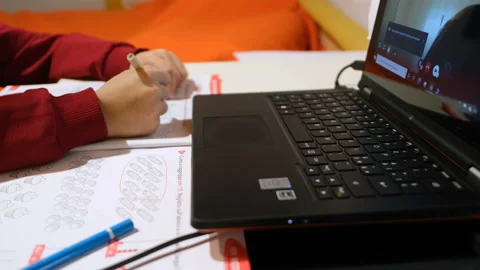 School boy doing smart home schooling lesson on laptop video chat,education 4k Video stock 142014891
