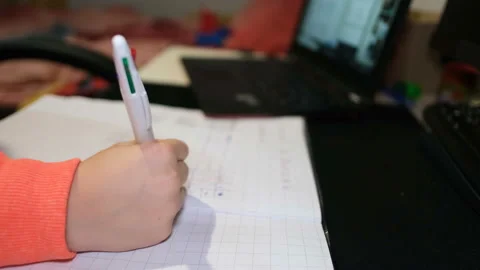 School boy doing smart home schooling math lesson on laptop chat,education 4k Stock Footage 144439037