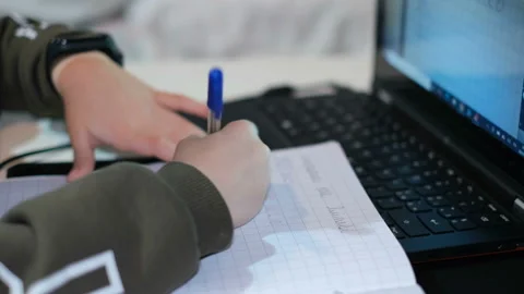 School boy doing smart home schooling math lesson on laptop,distance education Video stock 146488966