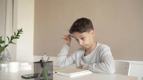 School boy having trouble with his homework. Vídeos de archivo 142032028